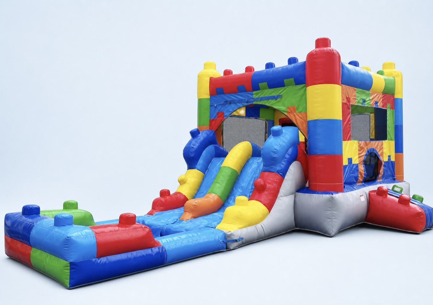 Primary-color block-themed bounce-and-slide combo on a clean studio background